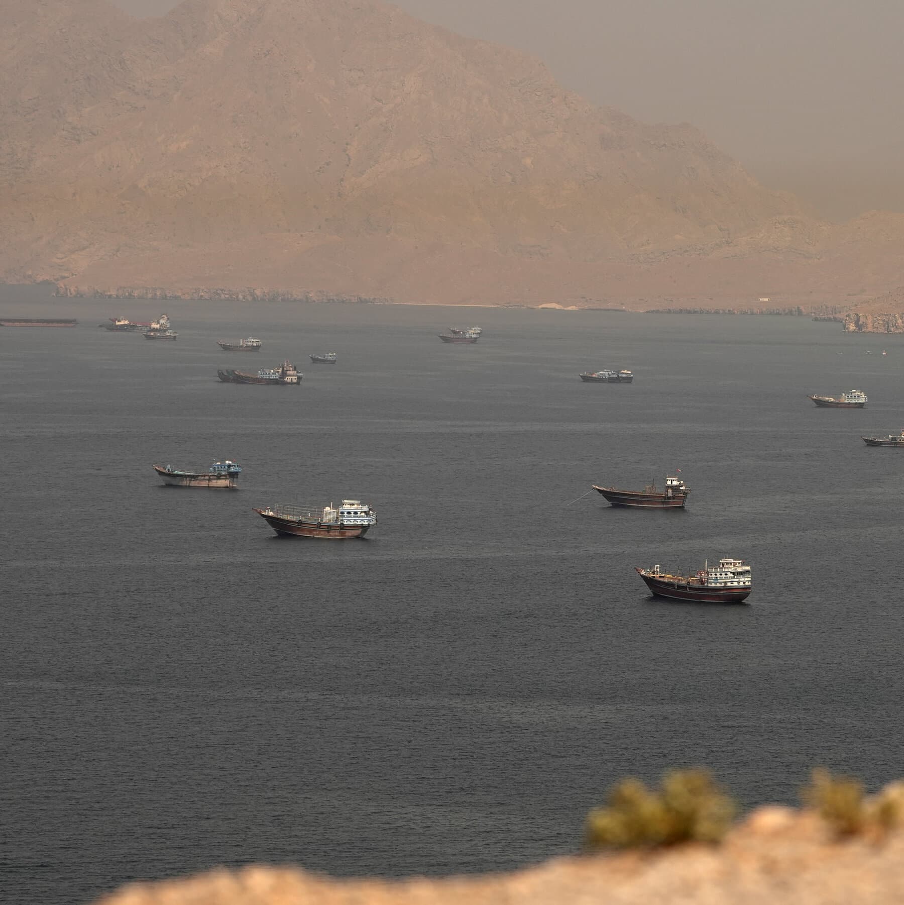 in-a-still-turbulent-strait-of-hormuz-stranded-ships-wait-for-clarity